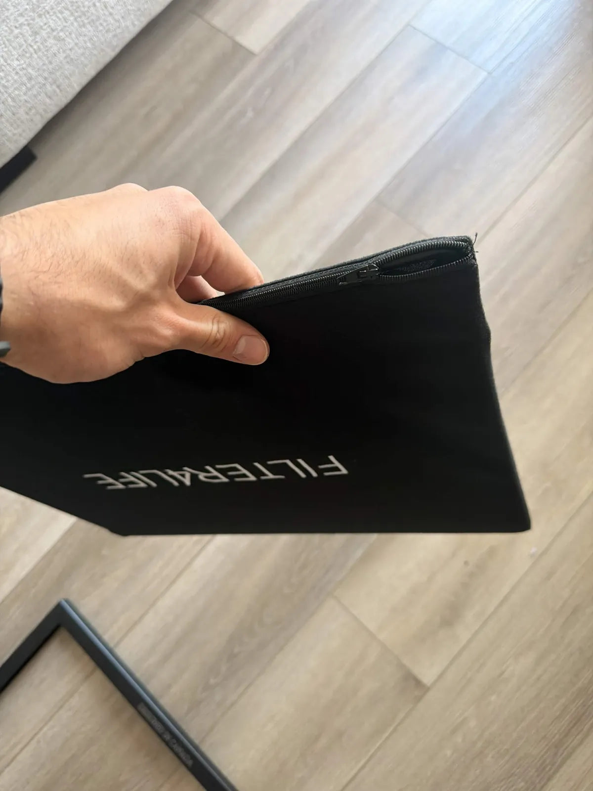 Unzip the sleeve.